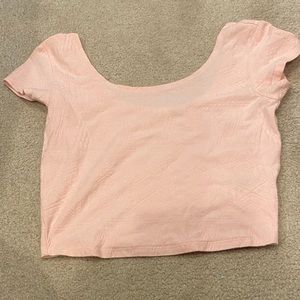 Pale pink pattered cropped shirt.  Size small.